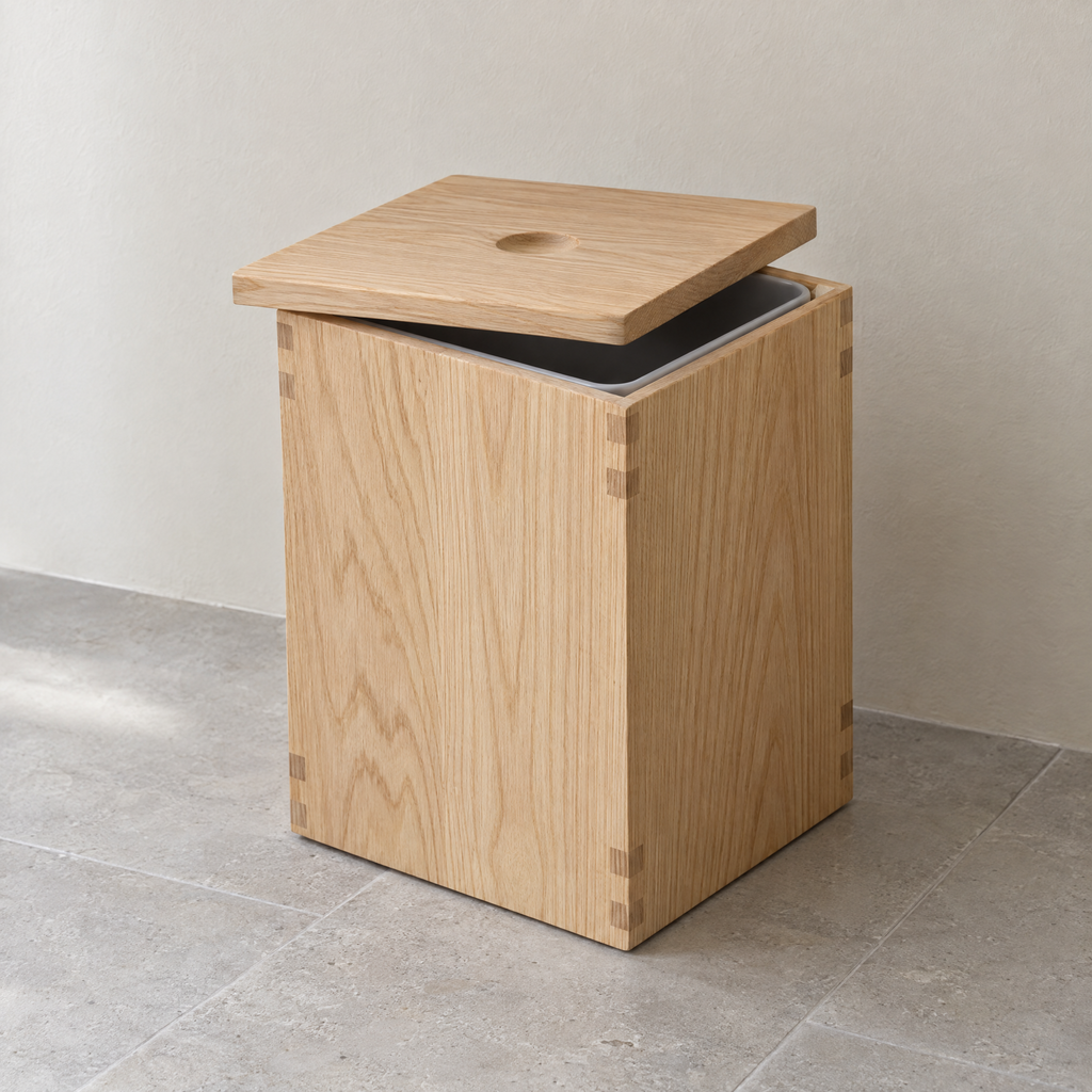 Lidded bathroom bin in natural oiled ash