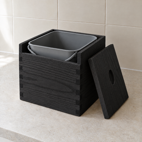 Countertop compost box in black-stained ash with its lid off