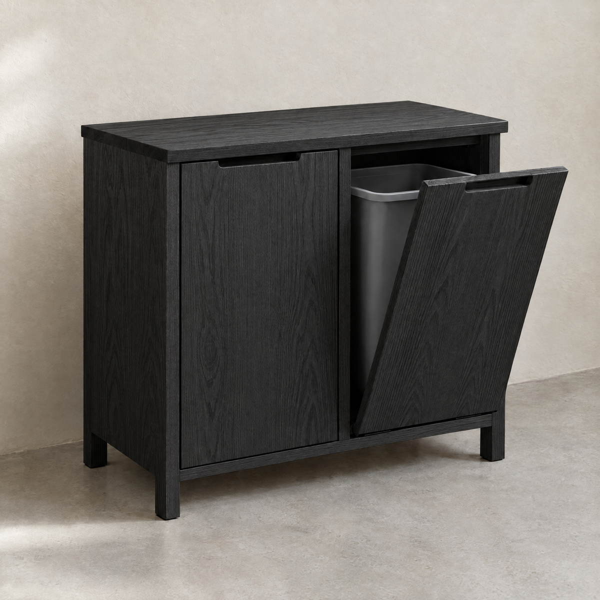 Double tilt-out bin cabinet in black-stained ash with one door open
