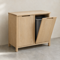 Double tilt-out bin cabinet in natural oiled ash with one door open