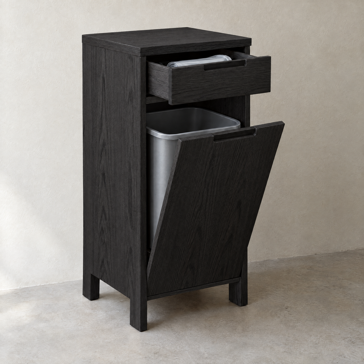 Tilt-out bin cabinet with liner drawer in black-stained ash