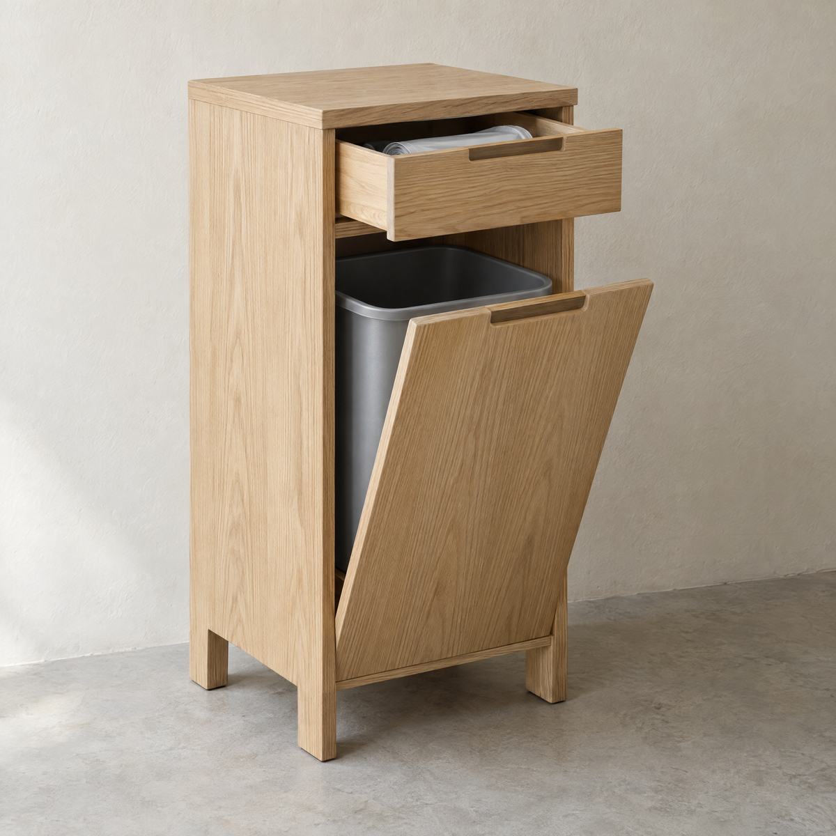 Tilt-out bin cabinet with liner drawer in natural oiled ash
